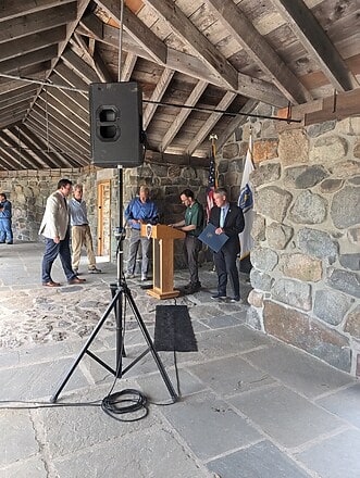 Brian Arrigo, Commissioner of the Massachusetts Department of Conservation and Recreation speaking at the Eliot Tower ribbon cutting ceremony.
