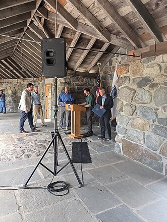 Brian Arrigo, Commissioner of the Massachusetts Department of Conservation and Recreation speaking at the Eliot Tower ribbon cutting ceremony.
